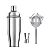 Kit cocktail 3 pièces avec shaker, passoire cocktail et doseur jigger sur fond blanc